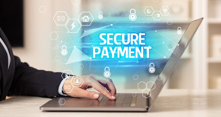 SECURE PAYMENT inscription on laptop, internet security and data protection concept, blockchain and cybersecurity