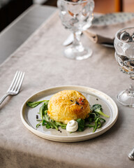 Baked camembert cheese in puff pastry on the served table
