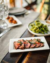 Restaurant table served with European fusion cuisine appetizers