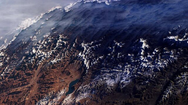 Snowy mountains Everest aerial satellite view scenic sunrise animation earth from sky. Contains images by Nasa
