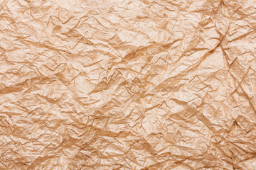 Parchment paper background. Coffee stains background. Brown crumpled texture. Burned letter structure. Wrinkled antique rustic stained paper backdrop. Grunge spray brown stains. Ancient look.