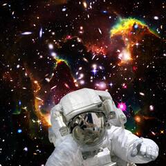 Fototapeta na wymiar Astronaut and galaxy. The elements of this image furnished by NASA.