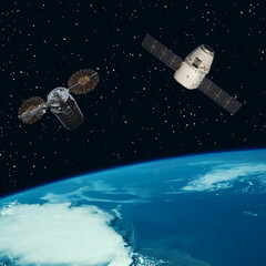 Satellites above the earth. The elements of this image furnished by NASA.