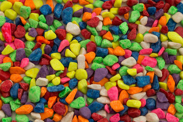 Fototapeta na wymiar colorful beads and stones on the white background.