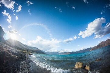 Lake Bangong, Ladakh, border with China, Panoramas of the Himalayas, North India, Zanskar, Tibet, landscape with clouds and sun