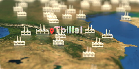 Fototapeta premium Tbilisi city and factory icons on the map, industrial production related 3D rendering