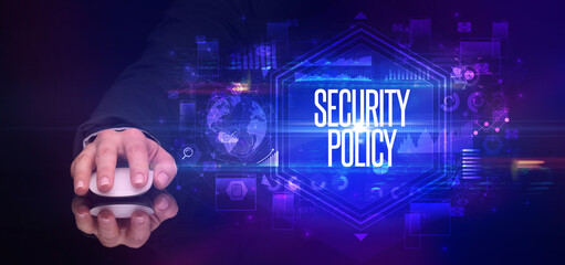 hand holding wireless peripheral with SECURITY POLICY inscription, cyber security concept