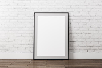 Blank white picture on wooden floor.