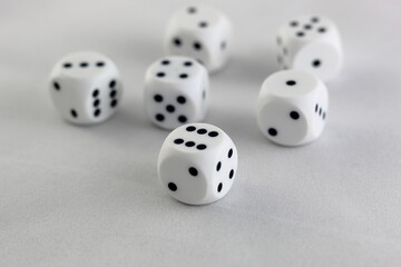 six white dice on a white background