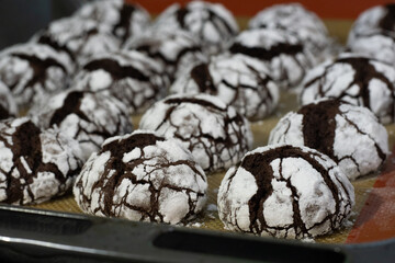 Cooking marbled chocolate chip cookies on black table