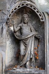 Historic Jesus on the winter mystery old Prague Cemetery, Czech Republic