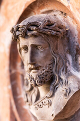 Obraz premium Historic Jesus on the winter mystery old Prague Cemetery, Czech Republic