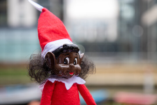 A Biracial Naughty Elf Doll