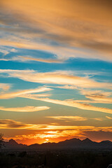 Sunset over the desert mountains