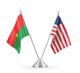 Liberia and Burkina Faso table flags isolated on white 3D rendering 