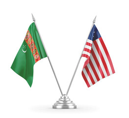 Liberia and Turkmenistan table flags isolated on white 3D rendering