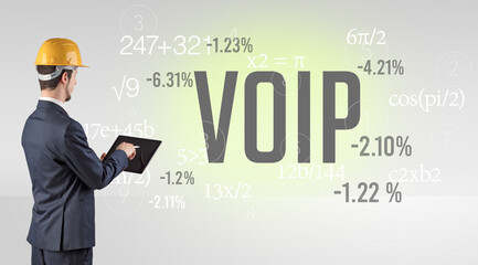 Technology Engineer in hard hat with VOIP abbreviation