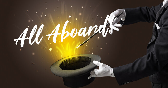 Magician is showing magic trick with All Aboard! inscription, traveling concept