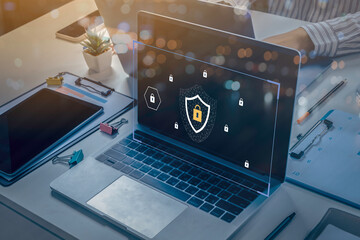 Person using a laptop computer with technology cybersecurity and privacy concept. protection and safe data for global network security