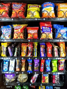 Syracuse, New York, U.S.A - October 19, 2019 - Variety of snacks inside a vending machine