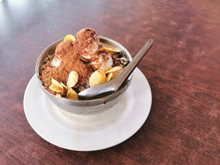 Selective focus photo with noise effect of mixed bean ice or locally known as Aiskrim Cendol Gula Apong.Famous desert at district Kota Belud.