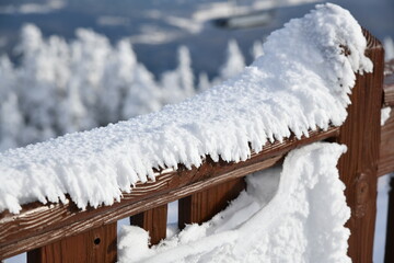 Fresh snow crystals on the observation deck at peak Mansfield summit - Stowe Ski resort, VT