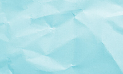 turquoise colored crumpled paper texture background for design, decorative.