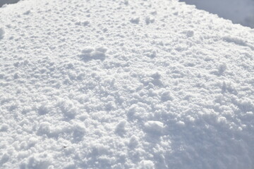 Close up of fresh snow on the cafe table observation deck at peak Mansfield summit - Stowe Mountain Ski resort, VT