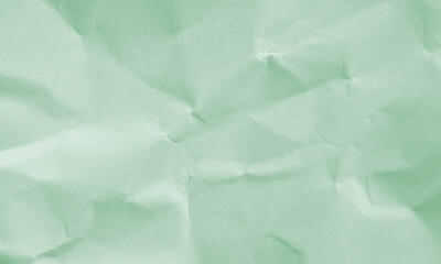 spring green colored crumpled paper texture background for design, decorative.