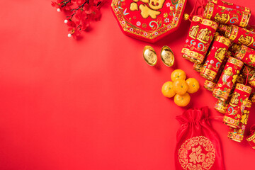 Chinese new year festival, Top view flat lay happy chinese new year or lunar new year decorations celebration with copy space on red background (Chinese character "fu" meaning fortune good luck)