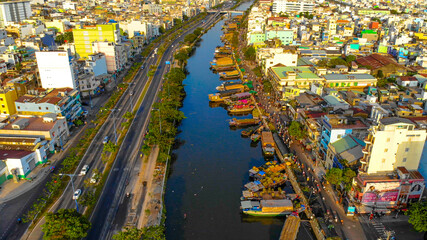 Aerial view of Ben Binh Dong (Binh Dong harbour) in lunar new year ( Tet Festical in Vietnam) with flower boats along side the river.
