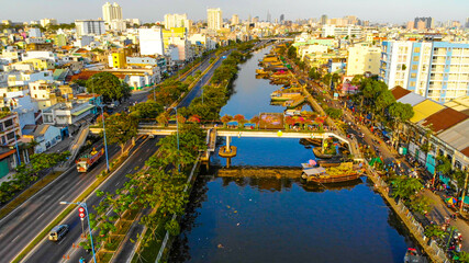 Aerial view of Ben Binh Dong (Binh Dong harbour) in lunar new year ( Tet Festical in Vietnam) with flower boats along side the river.