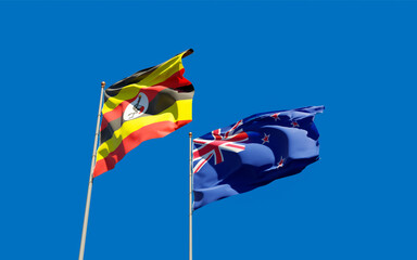 Flags of Uganda and New Zealand.