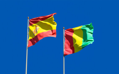 Flags of Guinea and Spain.