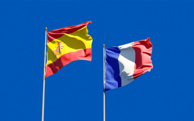 Flags of France and Spain.