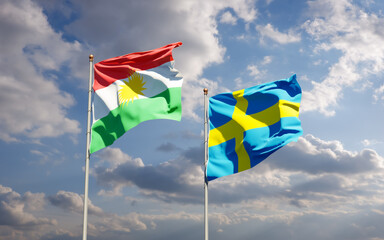Flags of Kurdistan and Sweden.