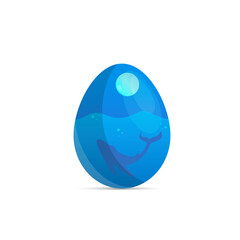 Happy Easter. Easter egg with ocean and blue whale on it. Isolated on a white background