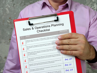  Sales & Operations Planning Checklist inscription on the piece of paper.