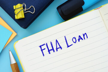 Business concept about FHA Loan with sign on the piece of paper.