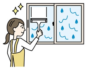 結露で濡れた窓をワイパー・スクイジーで掃除するエプロンの女性