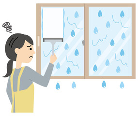 Fototapeta premium 結露で濡れた窓に悩むエプロンの女性 ワイパー スクイジー