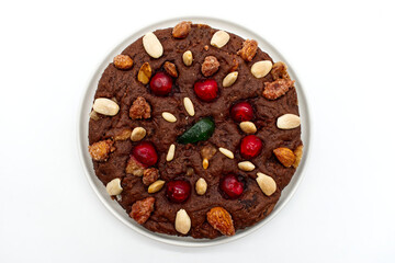 Certosino di Bologna is a typical italian Christmas dessert of bolognese cuisine with five chinese spices, honey, almonds, pine nuts, dark chocolate and candied fruit. © Claudio Caridi