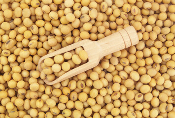 Soy beans with wooden scoop