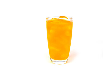 Drink of orange soda with ice in glass on white background. copy space