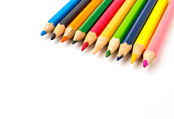 Colored pencils on white background. Stationery