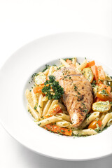 fried chicken breast with penne and saute vegetables pasta dish