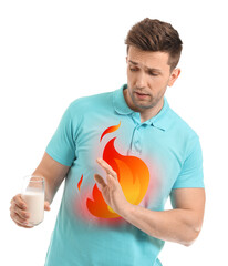 Young man with milk allergy on white background