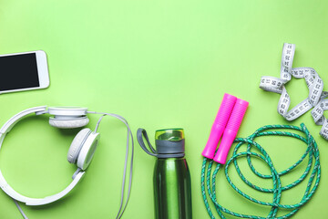 Set of sport equipment on color background