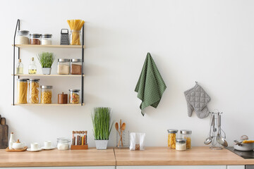 Utensils with products on counter in kitchen