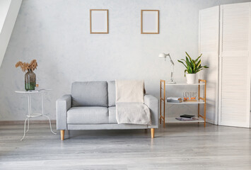 Interior of modern room with sofa
